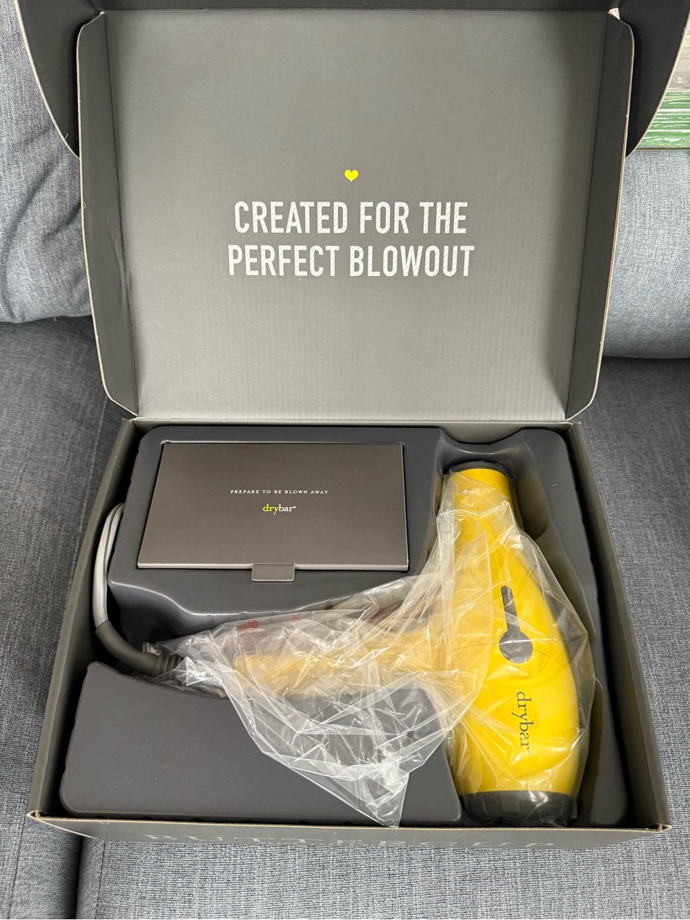 Drybar Yellow Compact Hair Dryer with Travel-Friendly Design